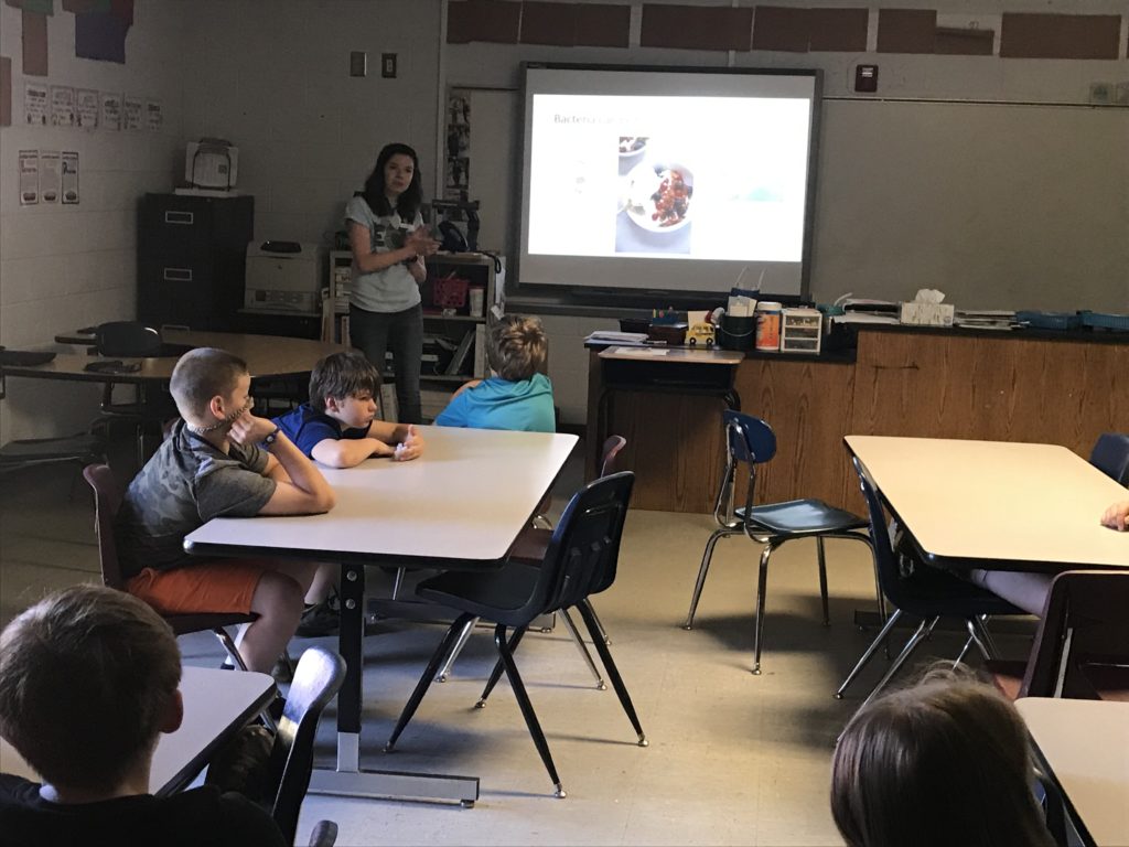 5th graders learning about microbes